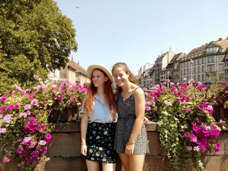 students surrounded by flowers in Germany